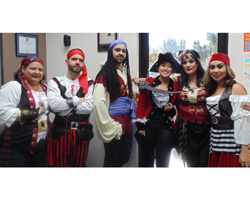 CyraCom Las Cruces Center employees in Halloween costumes