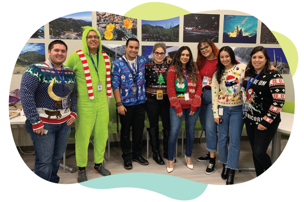 CyraCom Tucson Center employees in holiday outfits