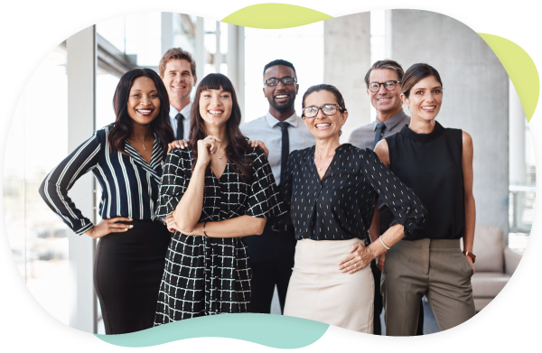 smiling professionals pose for group photo