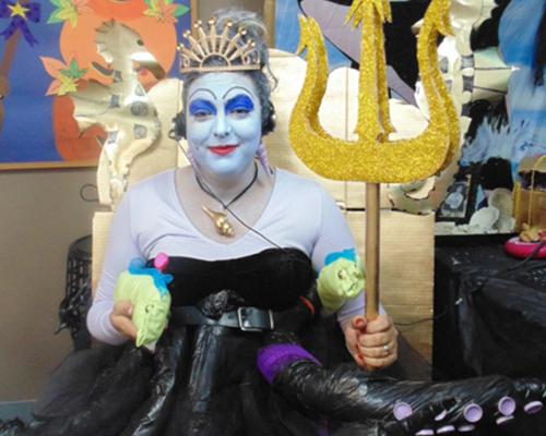CyraCom employee dressed as Ursula for Halloween