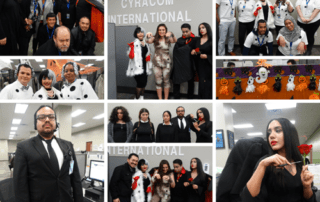 multiple CyraCom Queens Center employees in Halloween costumes