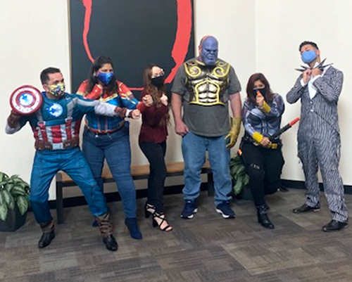 CyraCom Tampa Center employees dressed as Avengers heroes for Halloween