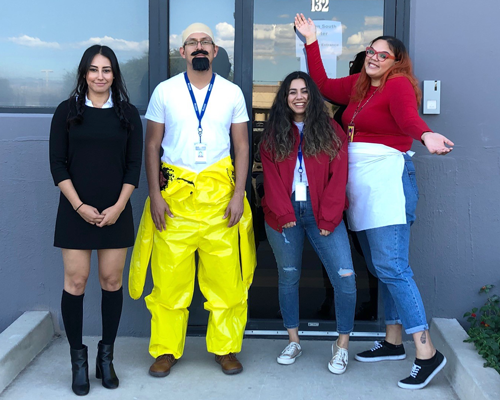CyraCom Tucson Center employees dressed in Halloween costumes
